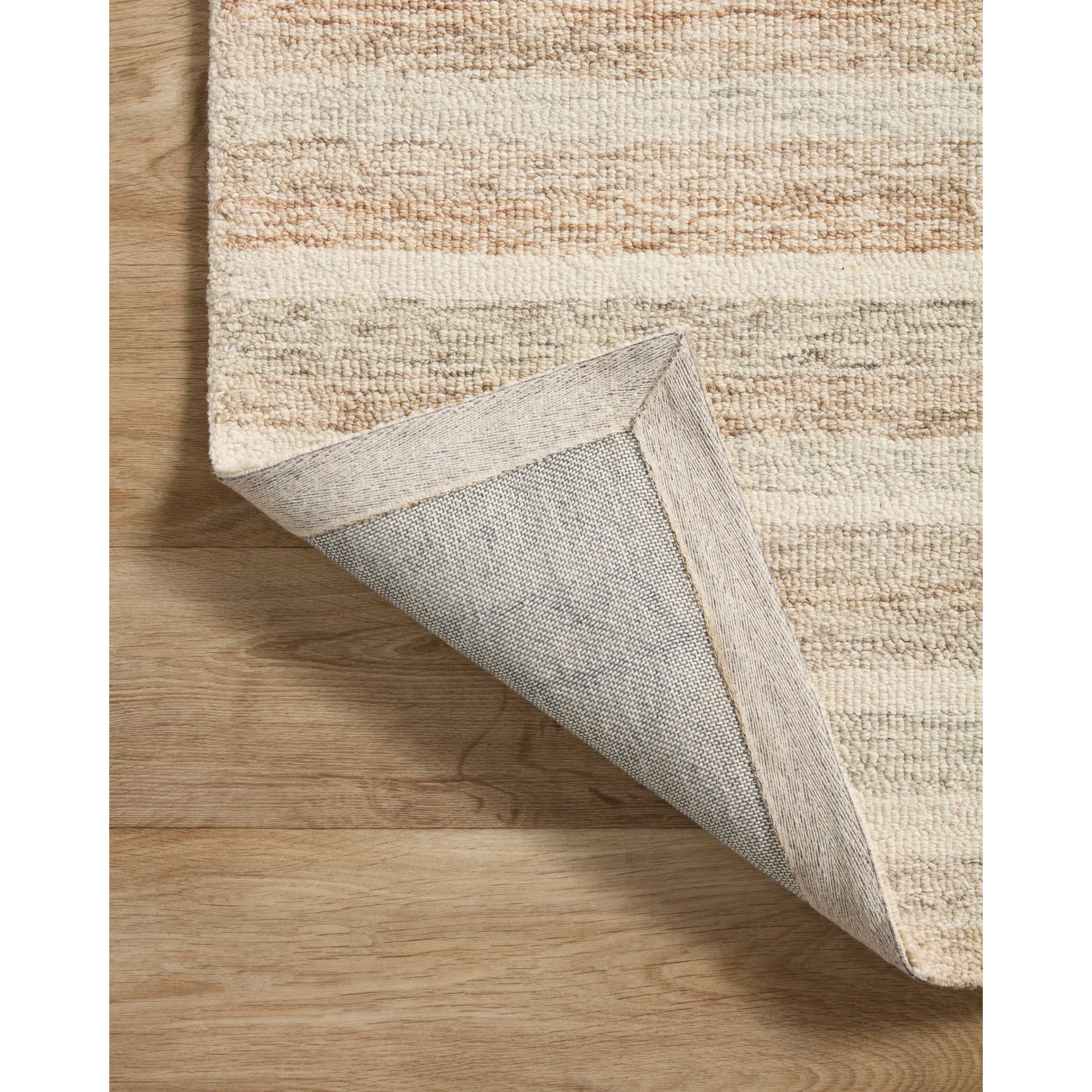 The subtle, warm tonal patterns remind us of our favorite California cool hemp rugs. Known for its durability, the Chris Ivory / Clay hooked wool rug is a smart choice for any room in your home that gets lots of love. Amethyst Home provides interior design services, furniture, rugs, and lighting in the Monterey metro area.