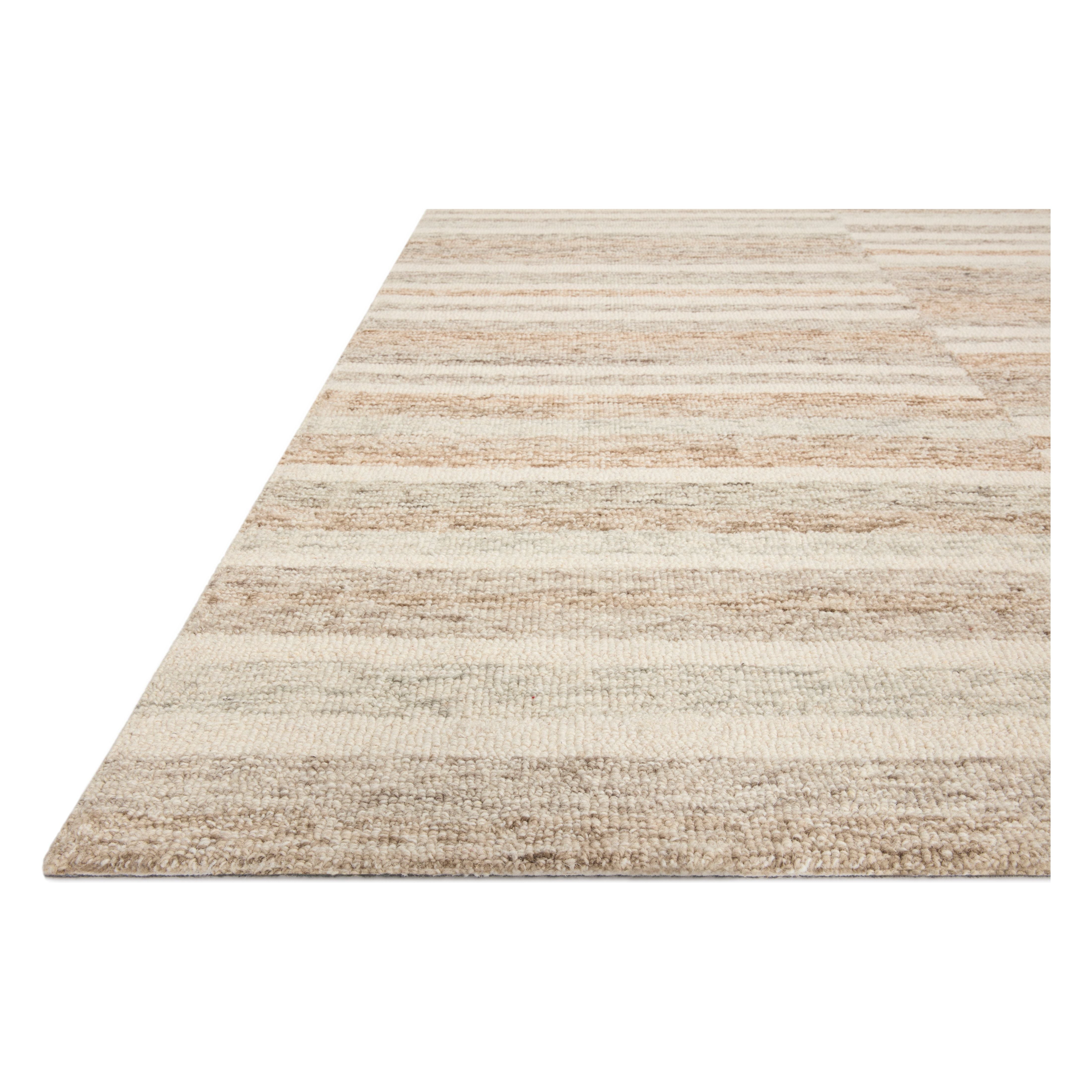 The subtle, warm tonal patterns remind us of our favorite California cool hemp rugs. Known for its durability, the Chris Ivory / Clay hooked wool rug is a smart choice for any room in your home that gets lots of love. Amethyst Home provides interior design services, furniture, rugs, and lighting in the Seattle metro area.