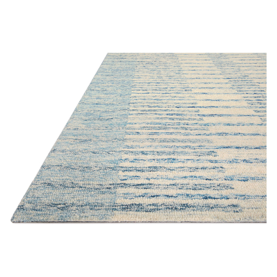 Blues skies ahead. We love this Chris Ivory / Denim rug for a coastal vibe where the only cares in the world are a day on the water. Amethyst Home provides interior design services, furniture, rugs, and lighting in the Salt Lake City metro area.