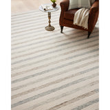 Known for its durability, the Chris Ivory / Slate hooked wool rug is a smart choice for any room in your home that gets lots of love. The subtle, tonal stripes remind us of our favorite California cool hemp rugs. Amethyst Home provides interior design services, furniture, rugs, and lighting in the Miami metro area.