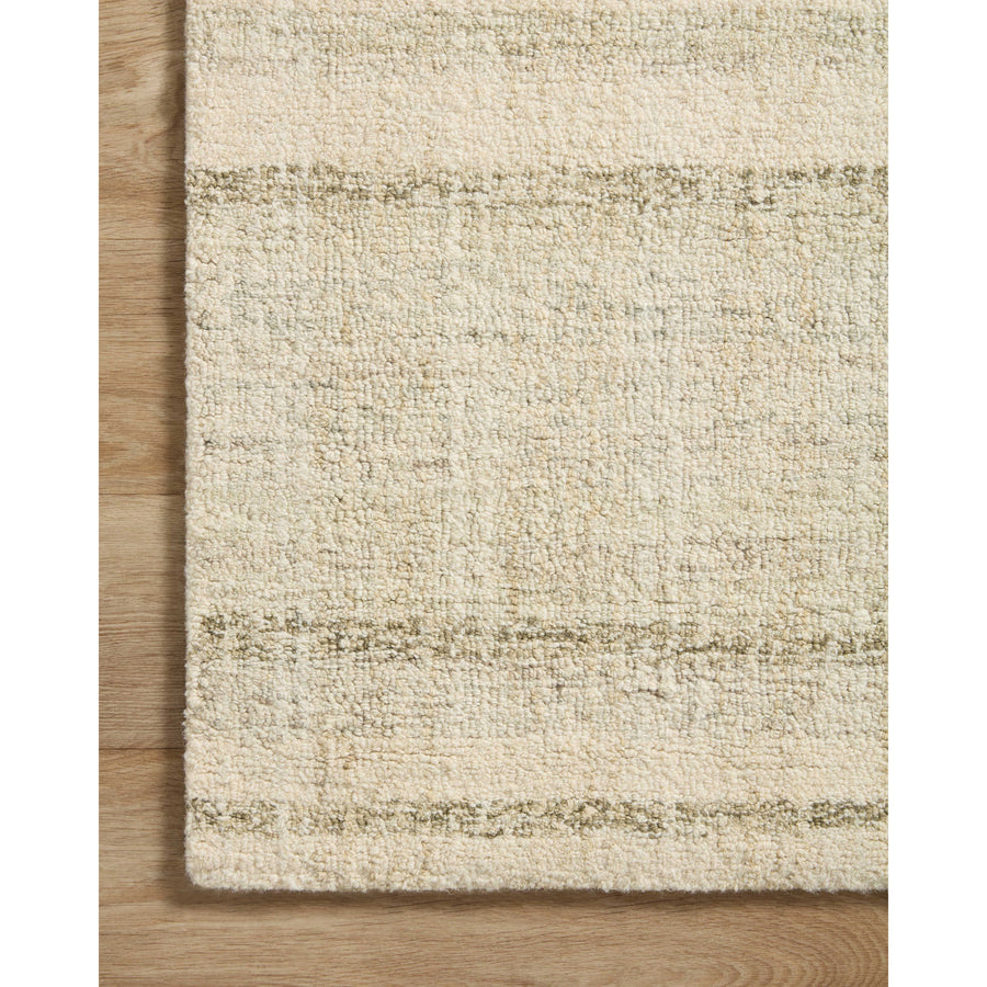 Green is totally in and we are here for it! The Chris Natural / Sage rug reminds us of our favorite casual, tonal stripe hemp rugs. Amethyst Home provides interior design services, furniture, rugs, and lighting in the Portland metro area.