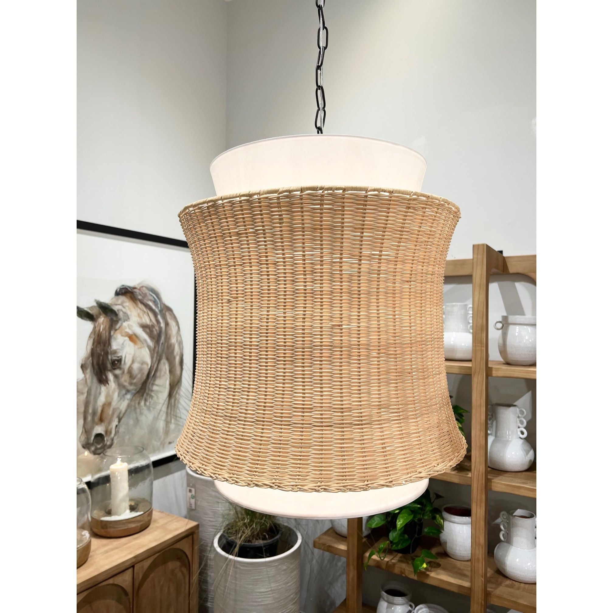 Made of fabric and beautifully natural woven rattan, the Chrisley Pendant Light is a wonderfully modern and airy fixture to hang above your kitchen island or bedroom nightstands. Amethyst Home provides interior design services, furniture, rugs, and lighting in the Austin metro area.