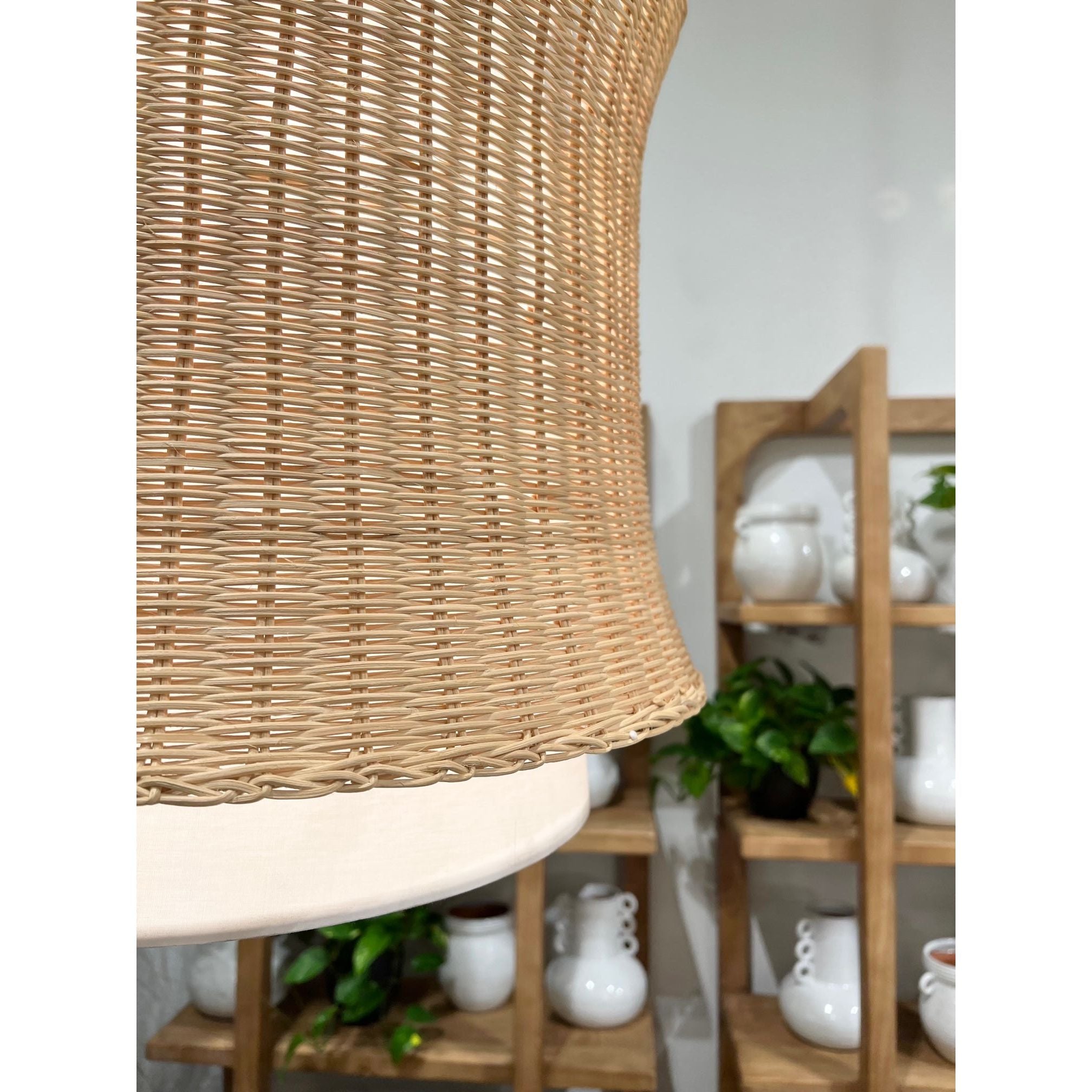 Made of fabric and beautifully natural woven rattan, the Chrisley Pendant Light is a wonderfully modern and airy fixture to hang above your kitchen island or bedroom nightstands. Amethyst Home provides interior design services, furniture, rugs, and lighting in the Houston metro area.