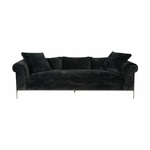 The Henrietta Upholstered Sofa Family by Cisco Brothers is the perfect centerpiece to your living room style. This dapper sofa has a distinctive style, with elegant roll arms and metal black-rust legs. Update your space with this mid-century influenced piece. Photographed in Velluto Midnight.
