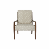 The Montauk Oak Upholstered Chair - Essentials evokes a feeling of warmth and family. This chair has its roots in mid-century style, with a beautiful oak wood frame. The Montauk would be perfectly placed in front of a roaring fireplace or in a cosy lakeside home.   Overall: 26"w x 33"d x 31"h