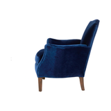 The Sebastian Chair has subtly swooping arms and a cupid’s bow back. The curvaceous silhouette is completed with a handsome tapered leg. The wide seat allows ample room to get cosy on a rainy afternoon and submerge yourself in a good book.  Overall: 29"w x 32"d x 34"h