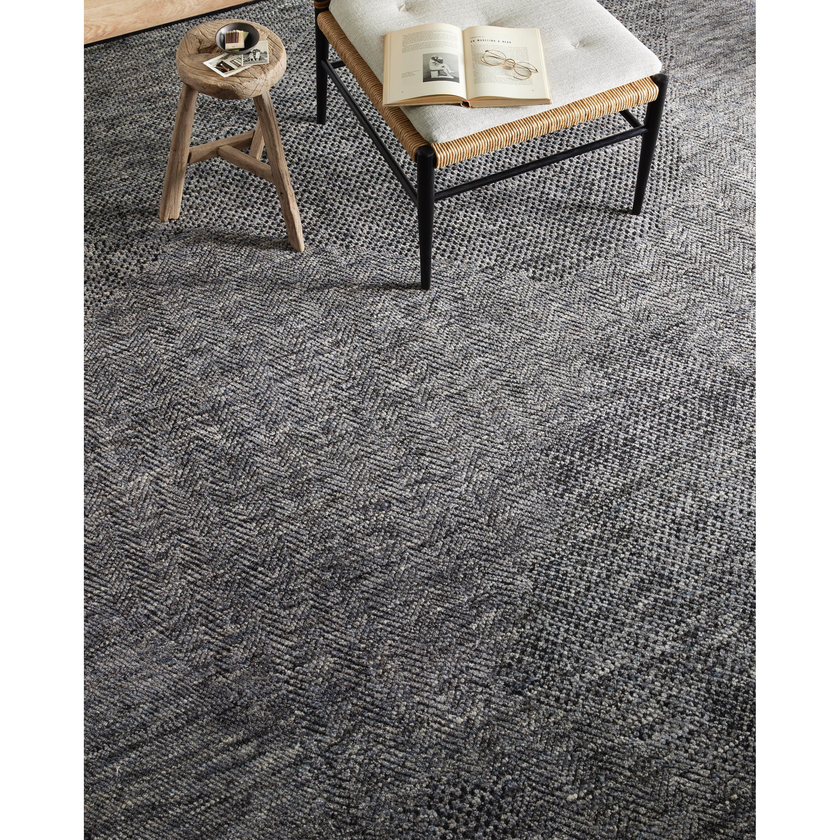 The Collins Amber Lewis x Loloi COI-01 AL Charcoal / Denim rug for Amber Lewis x Loloi is hand-knotted of wool and cotton by skilled artisans in India and GoodWeave-Certified. Collins features varying knotting techniques interwoven to create a uniquely texture pattern. Amethyst Home provides interior design, new construction, custom furniture, and rugs for the Monterey metro area.