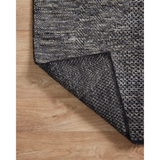 The Collins Amber Lewis x Loloi COI-01 AL Charcoal / Denim rug for Amber Lewis x Loloi is hand-knotted of wool and cotton by skilled artisans in India and GoodWeave-Certified. Collins features varying knotting techniques interwoven to create a uniquely texture pattern. Amethyst Home provides interior design, new construction, custom furniture, and rugs for the Seattle metro area.