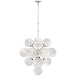 We love the white strie glass globes on this Cristol Large Chandelier. It brings a stunning and unique look to any living room, dining room, or kitchen  Designer: AERIN