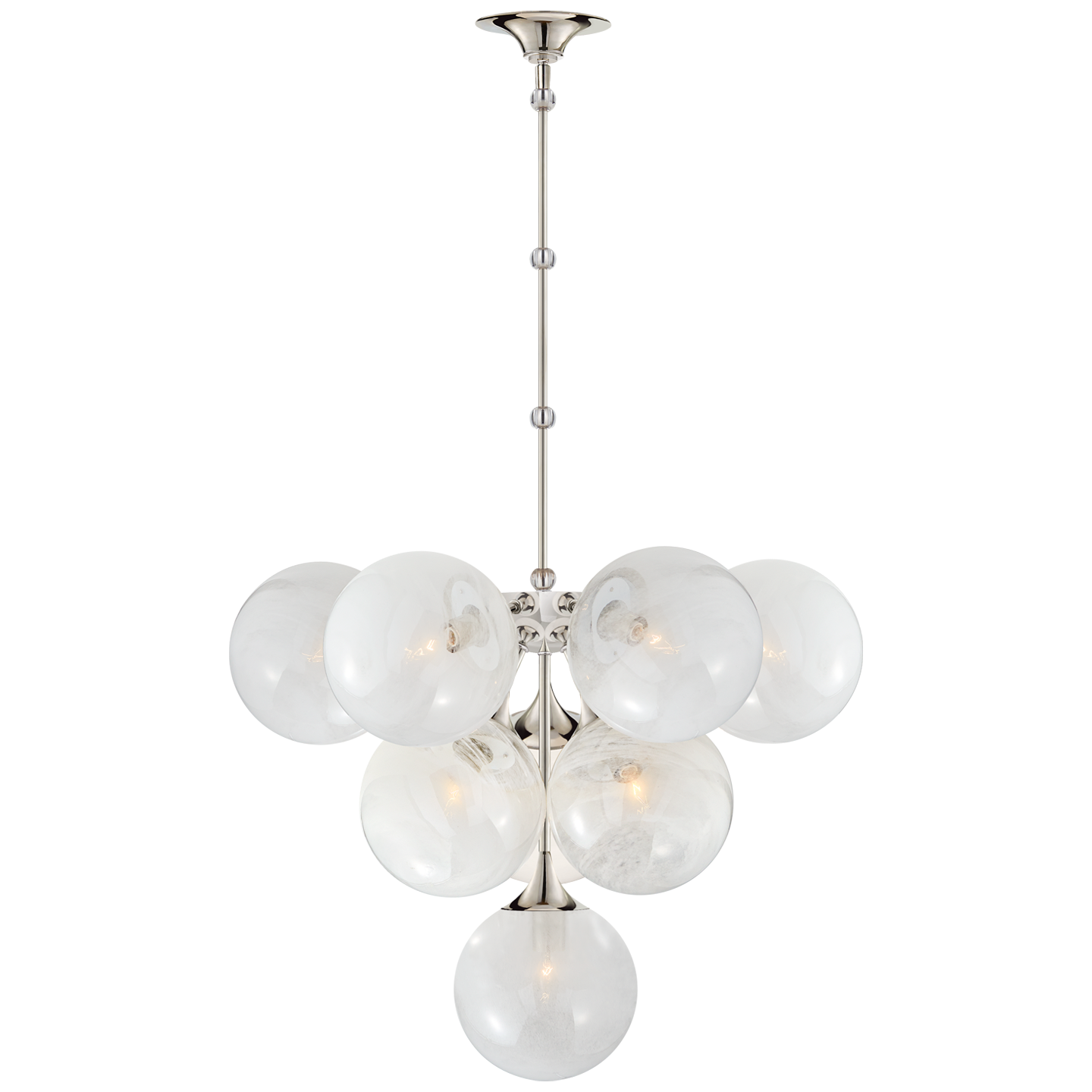 We love the white strie glass globes on this Cristol Medium Chandelier by Visual Comfort. It brings a stunning and unique look to any living room, dining room, or kitchen  Designer: AERIN