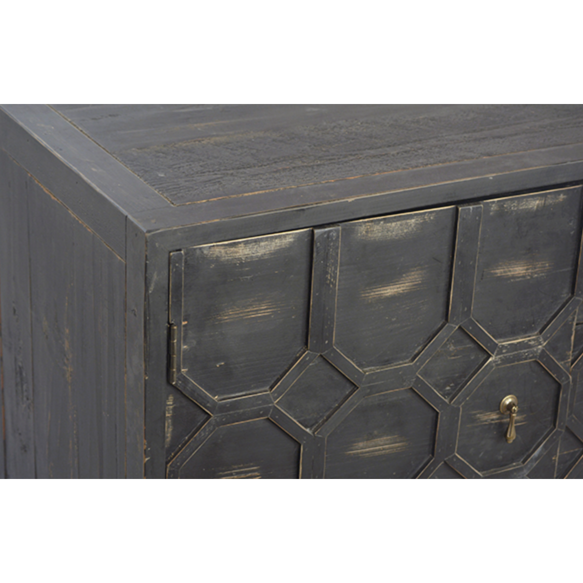 The Harten cabinet is beautifully crafted of black stained pine.  Its versatile cabinet drawer combo is perfect for both media and dining room storage.  Size: 63"l x 20"d x 31"h  Finish may vary slightly by piece as this is a hand-crafted product.  Please allow 3-5 weeks for shipping.