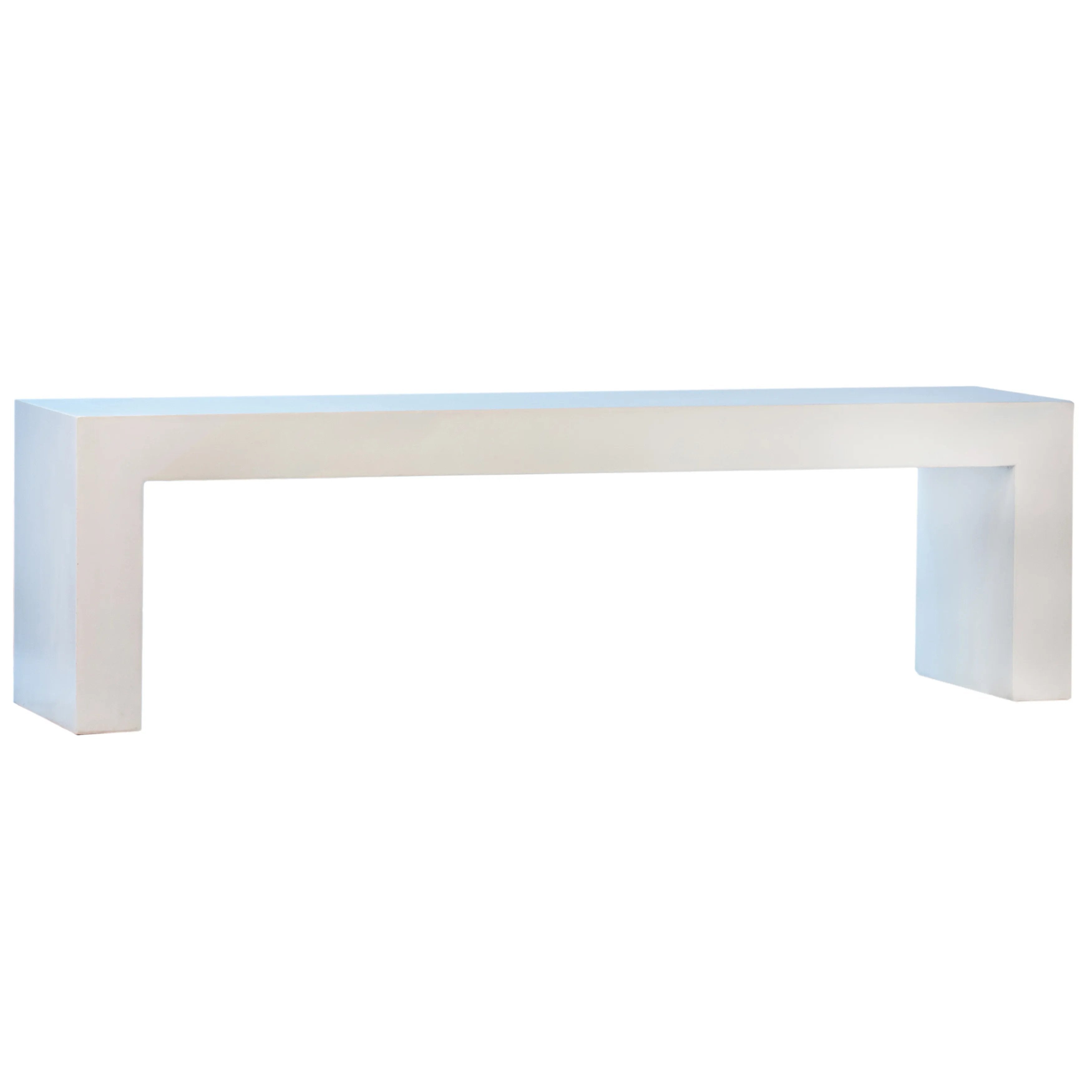 Suitable for both indoor and outdoor settings, this modern bench features a beautiful waterfall design. Naturally attractive and durable, measuring 63” in length, it is constructed with reinforced concrete. Featuring a white sealed finish, this three-seater bench is fresh and contemporary. Ideal as an entryway bench, dining bench, or patio bench. Amethyst Home provides interior design, new home construction design consulting, vintage area rugs, and lighting in the San Diego metro area.