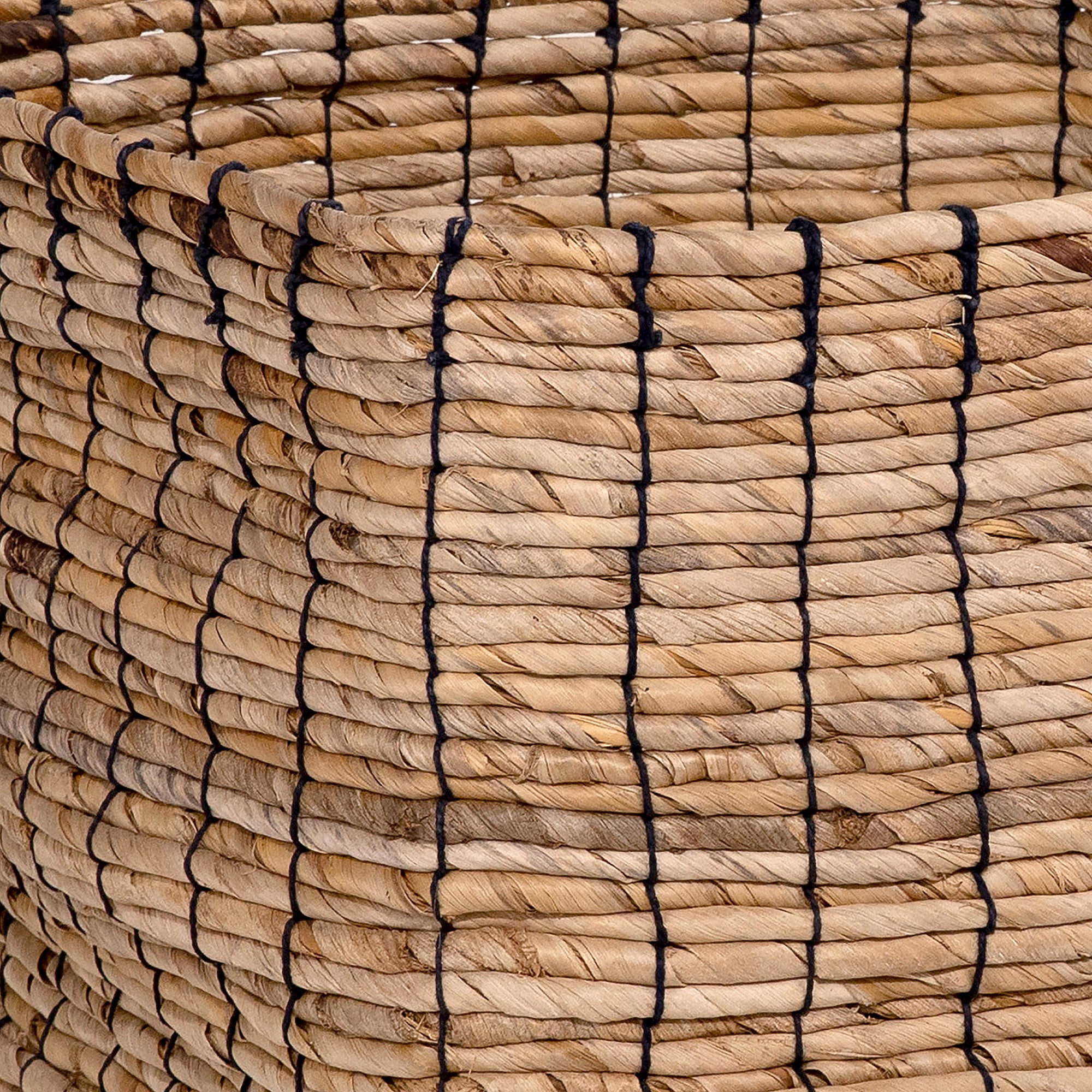 In terms of beauty and functionality, this basket adds dimension and storage wherever it's placed. Beautifully handcrafted in Indonesia using woven Abaca strands. It showcases a square shape figure that makes it easy to style under a console or beside a sofa, perfect for storing towels, throws, or housing your favorite potted plant. Amethyst Home provides interior design, new home construction design consulting, vintage area rugs, and lighting in the Miami metro area.