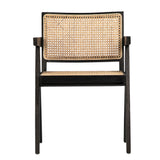 Finished in an antique black and natural rattan, this beautiful Norwich dining chair is modern with a tropical flare. Amethyst Home provides interior design, new construction, custom furniture, and area rugs in the Dallas metro area.