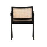 Finished in an antique black and natural rattan, this beautiful Norwich dining chair is modern with a tropical flare. Amethyst Home provides interior design, new construction, custom furniture, and area rugs in the Winter Garden metro area.
