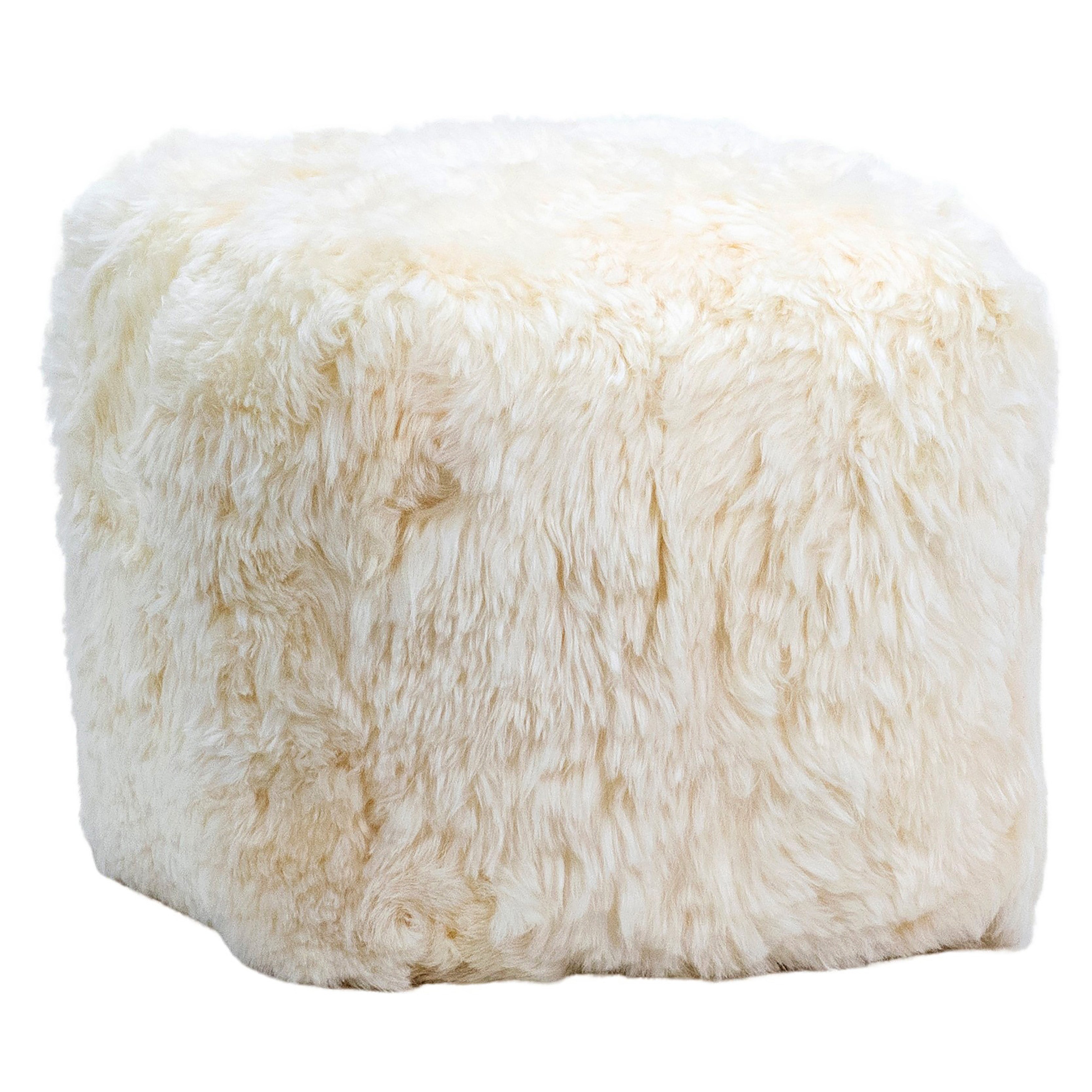 A classic accent piece designed with style and function in mind. This 16x16” Pouf can be used as an extra seat or ottoman to rest up your feet. Crafted from genuine sheep fur for an over-the-top luxurious touch. Featuring a natural white color that blends well with a variety of decor schemes in your home.Depth : 16 in Amethyst Home provides interior design, new home construction design consulting, vintage area rugs, and lighting in the Newport Beach metro area.