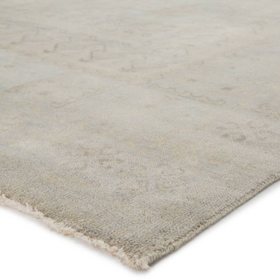 The Eloquent Chival Area Rug by Jaipur Living, or ELQ02, emanates traditional elegance, lending a soft and serene look to transitional homes. The hand-knotted Chival area rug features a washed vintage-inspired design in muted gray and beige tones. Perfect for the bedroom, living room, or other medium traffic areas. 