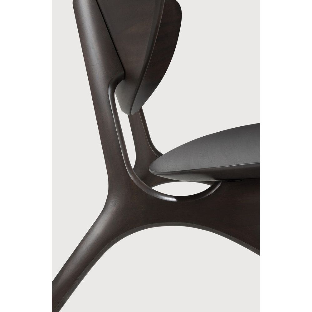 Beauty is in the eye of the beholder. With sleek, angular, front legs and flowing smooth connections, the Eye lounge chair is a hallmark solid wooden seating design. The curved backrest, reminiscent of a winked eye, inspired the name of the chair. Think subtle elegance with a stylish edge. Amethyst Home provides interior design, new home construction design consulting, vintage area rugs, and lighting in the Boston metro area.