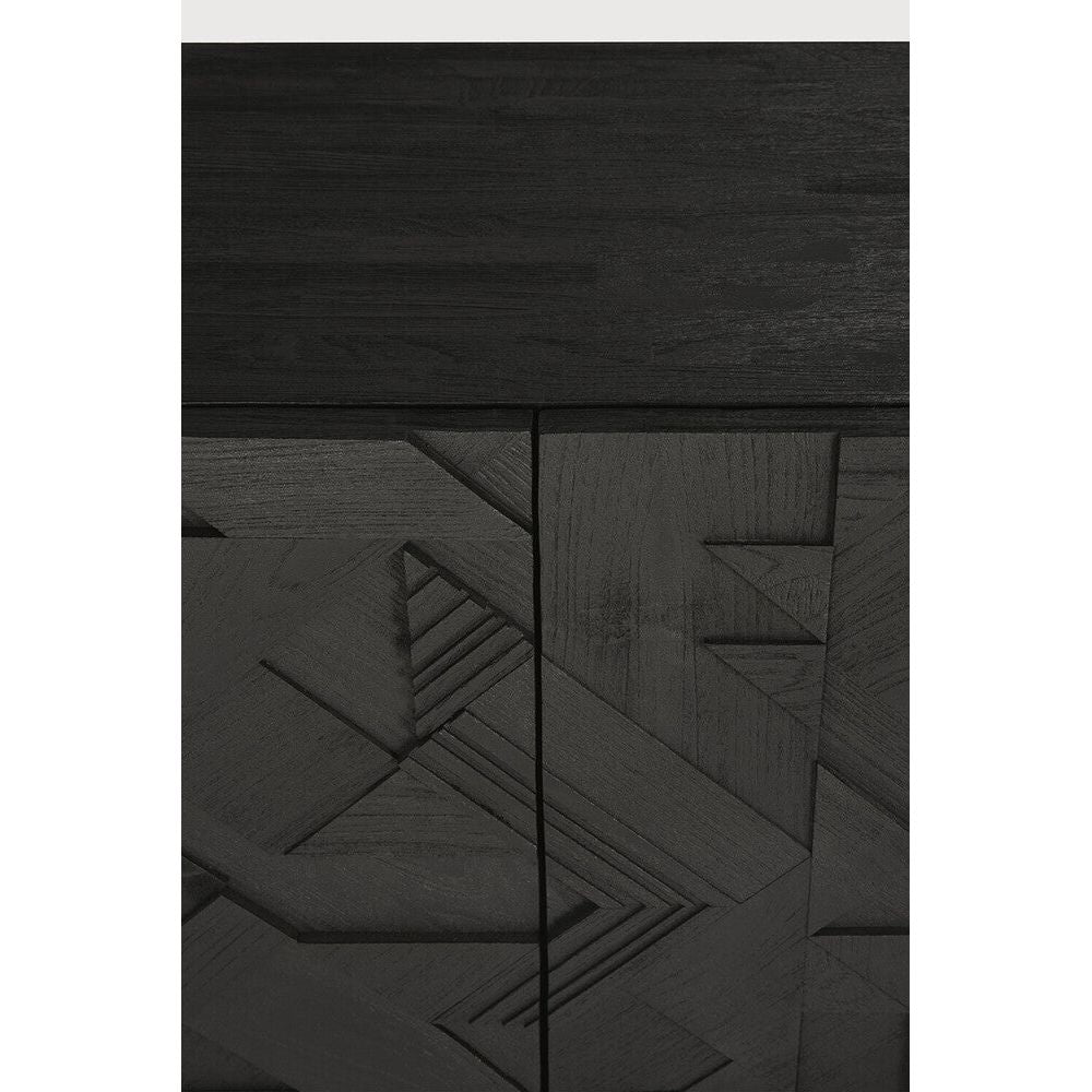 Featuring Graphic Sideboard Teak Black by Ethnicraft at Amethyst Home. In his quest to add movement to the surface, designer Alain van Havre started layering and combining triangular shapes. Before he knew it he had created a visually enticing composition out of teak and the Graphic design was born. By using multiple layers, a sense of depth and dynamism is cre. Amethyst Home provides interior design, new home construction design consulting, vintage area rugs, and lighting in the Tampa metro area.