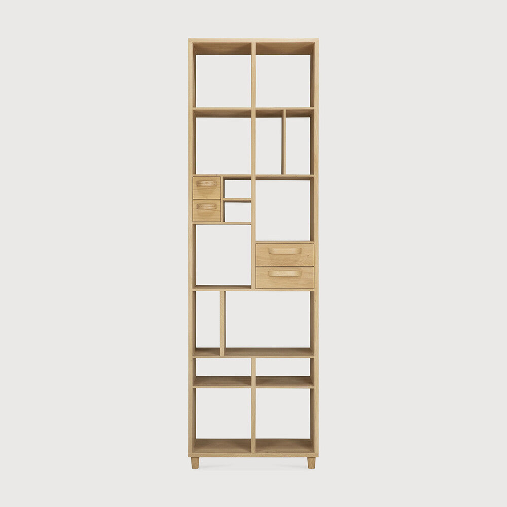 Playful yet somber, the 60s-inspired Pirouette bookrack is a functional storage space that doubles as a statement piece. Amethyst Home provides interior design, new home construction design consulting, vintage area rugs, and lighting in the Portland metro area.