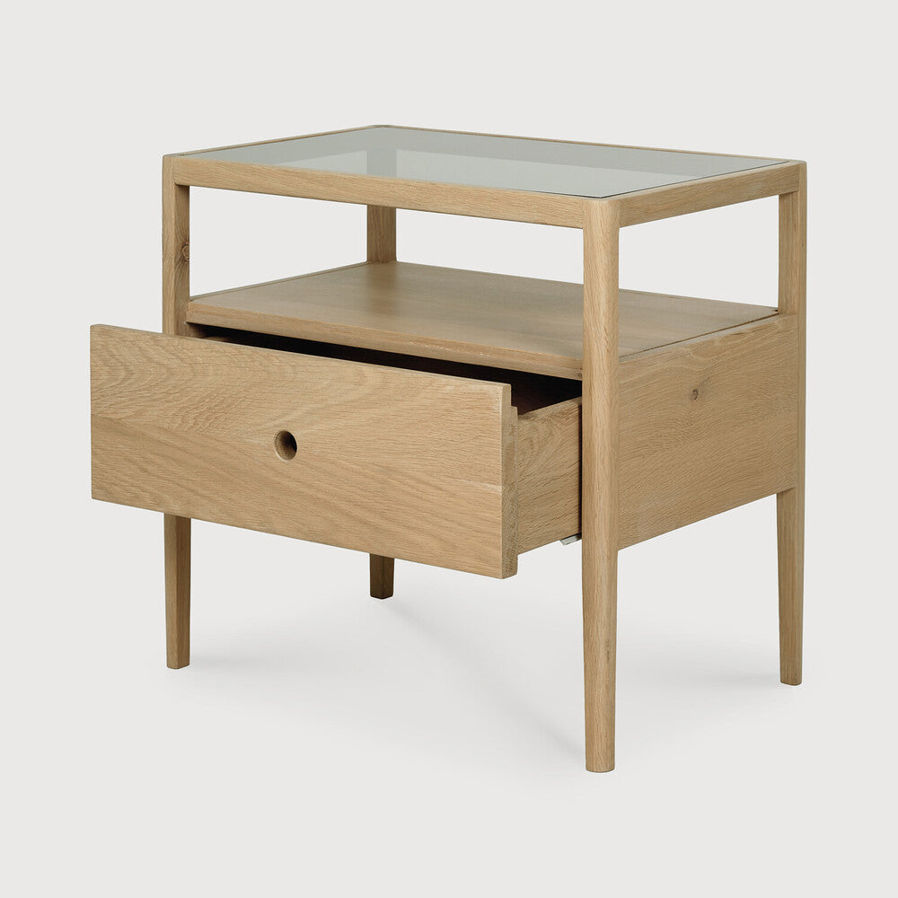 With its one drawer, open space and slightly tapered legs, the Spindle bedside table is the perfect no-nonsense companion for the striking Spindle bed. Amethyst Home provides interior design, new home construction design consulting, vintage area rugs, and lighting in the Austin metro area.