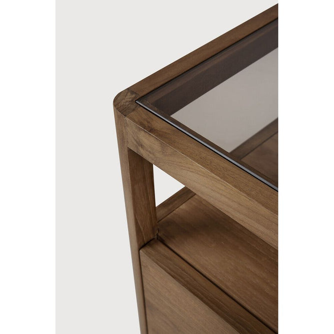 With its one drawer, open space and slightly tapered legs, the Spindle bedside table is the perfect no-nonsense companion for the striking Spindle bed. Reclaimed teak offers a truly unique finish for each and every item — the origin of each hand-finished piece of furniture carries its own story in its material. Amethyst Home provides interior design, new home construction design consulting, vintage area rugs, and lighting in the Nashville metro area.