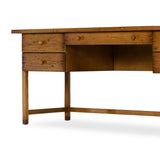 It's a material thing. Made entirely from solid pine, a specialized waxed finish gives this roomy five-drawer desk a purposefully antiqued look. Amethyst Home provides interior design, new home construction design consulting, vintage area rugs, and lighting in the Winter Garden metro area.