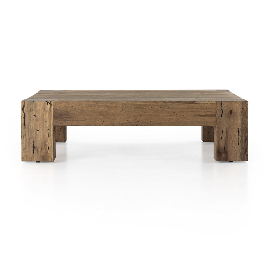 Made from thick-cut oak veneer with a faux rustic finish made to emulate wormwood, the Abaso Rustic Wormwood Oak Coffee Table is a low, large-scale coffee table that features chunky squared legs and dovetail joinery detailing. Amethyst Home provides interior design services, furniture, rugs, and lighting in the Dallas metro area.