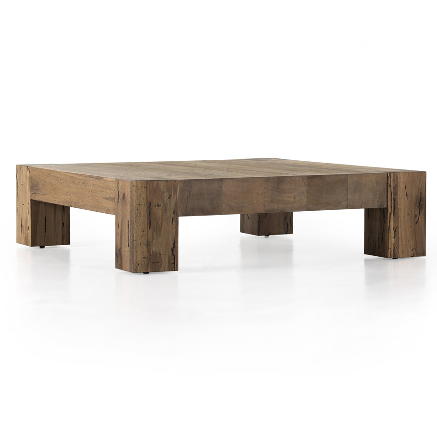 Made from thick-cut oak veneer with a faux rustic finish made to emulate wormwood, the Abaso Rustic Wormwood Oak Coffee Table is a low, large-scale coffee table that features chunky squared legs and dovetail joinery detailing. Amethyst Home provides interior design services, furniture, rugs, and lighting in the Kansas City metro area.