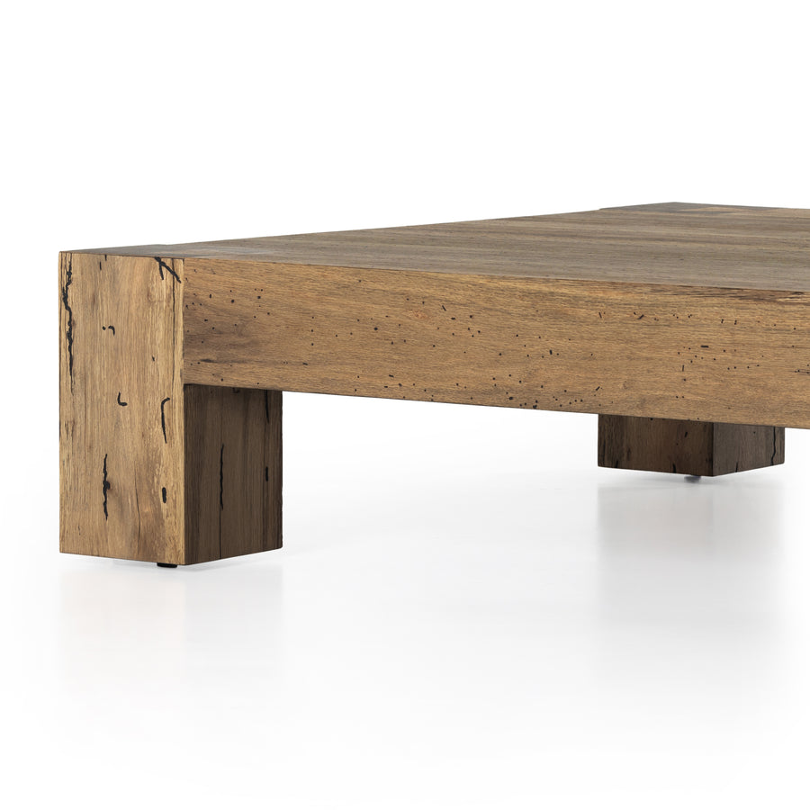 Made from thick-cut oak veneer with a faux rustic finish made to emulate wormwood, the Abaso Rustic Wormwood Oak Coffee Table is a low, large-scale coffee table that features chunky squared legs and dovetail joinery detailing. Amethyst Home provides interior design services, furniture, rugs, and lighting in the Salt Lake City metro area.