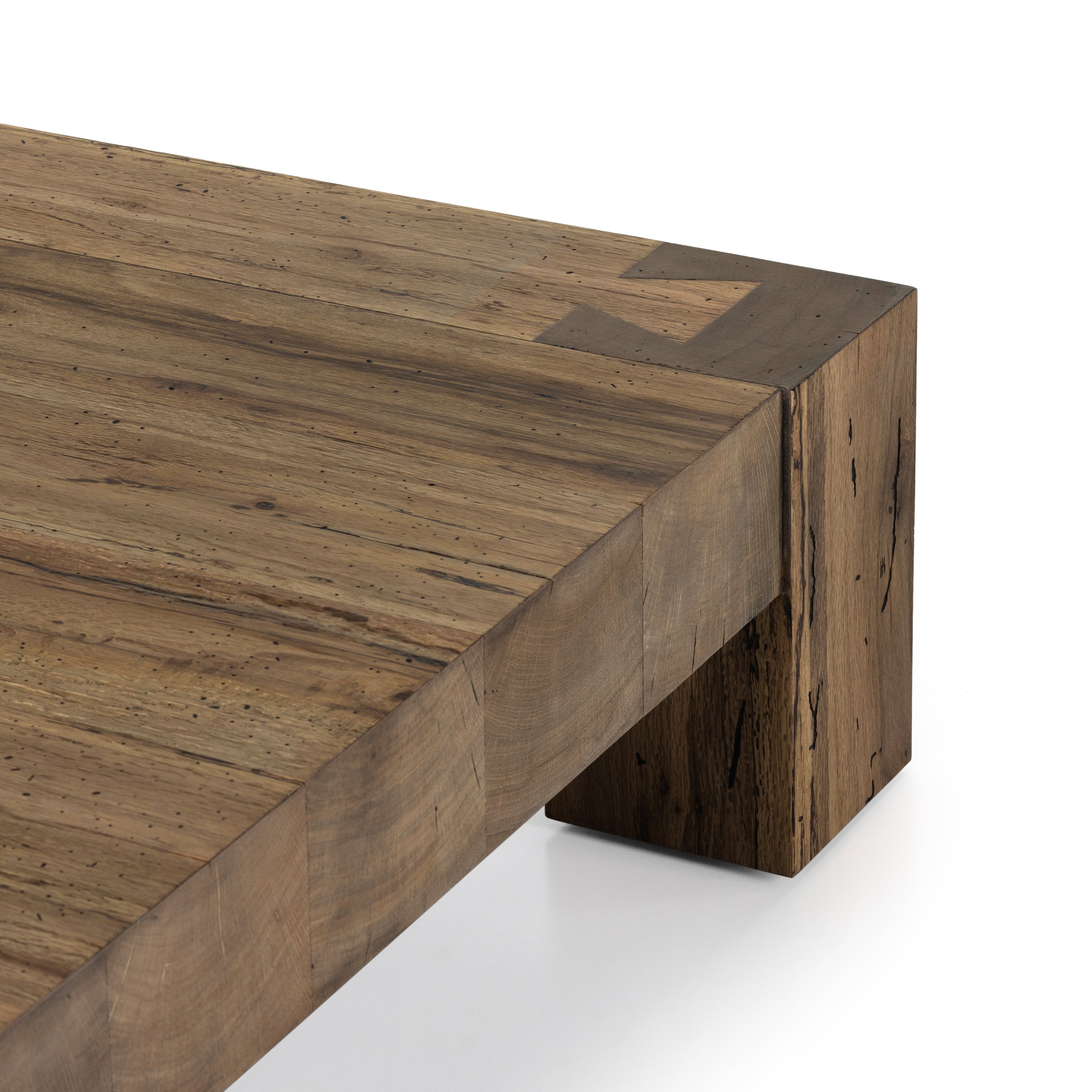 Made from thick-cut oak veneer with a faux rustic finish made to emulate wormwood, the Abaso Rustic Wormwood Oak Coffee Table is a low, large-scale coffee table that features chunky squared legs and dovetail joinery detailing. Amethyst Home provides interior design services, furniture, rugs, and lighting in Seattle metro area.