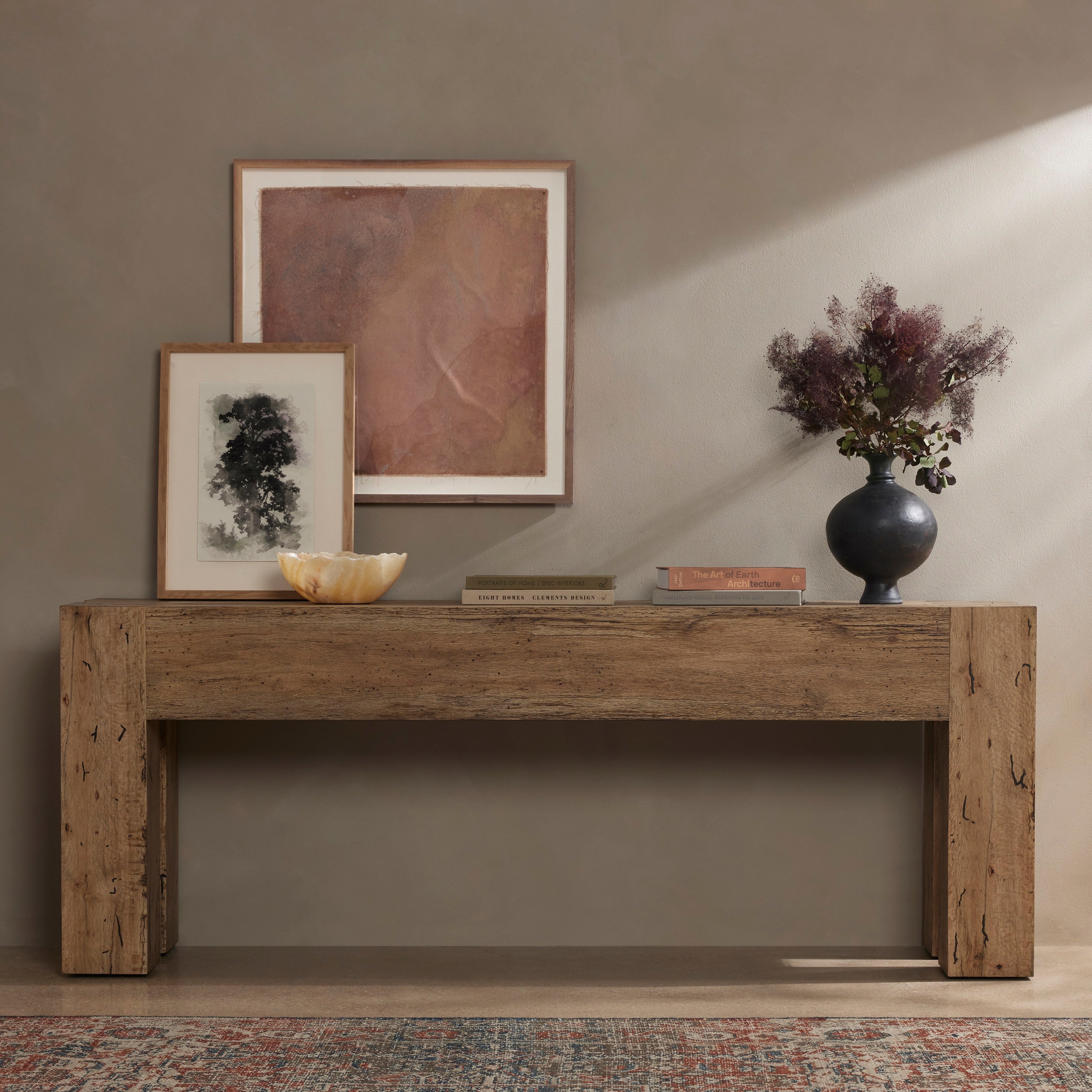 Made from thick-cut oak veneer with a faux rustic finish made to emulate wormwood, this Abaso Rustic Wormwood Oak Console Table features chunky squared legs and dovetail joinery detailing. Amethyst Home provides interior design services, furniture, rugs, and lighting in the Calabasas metro area.