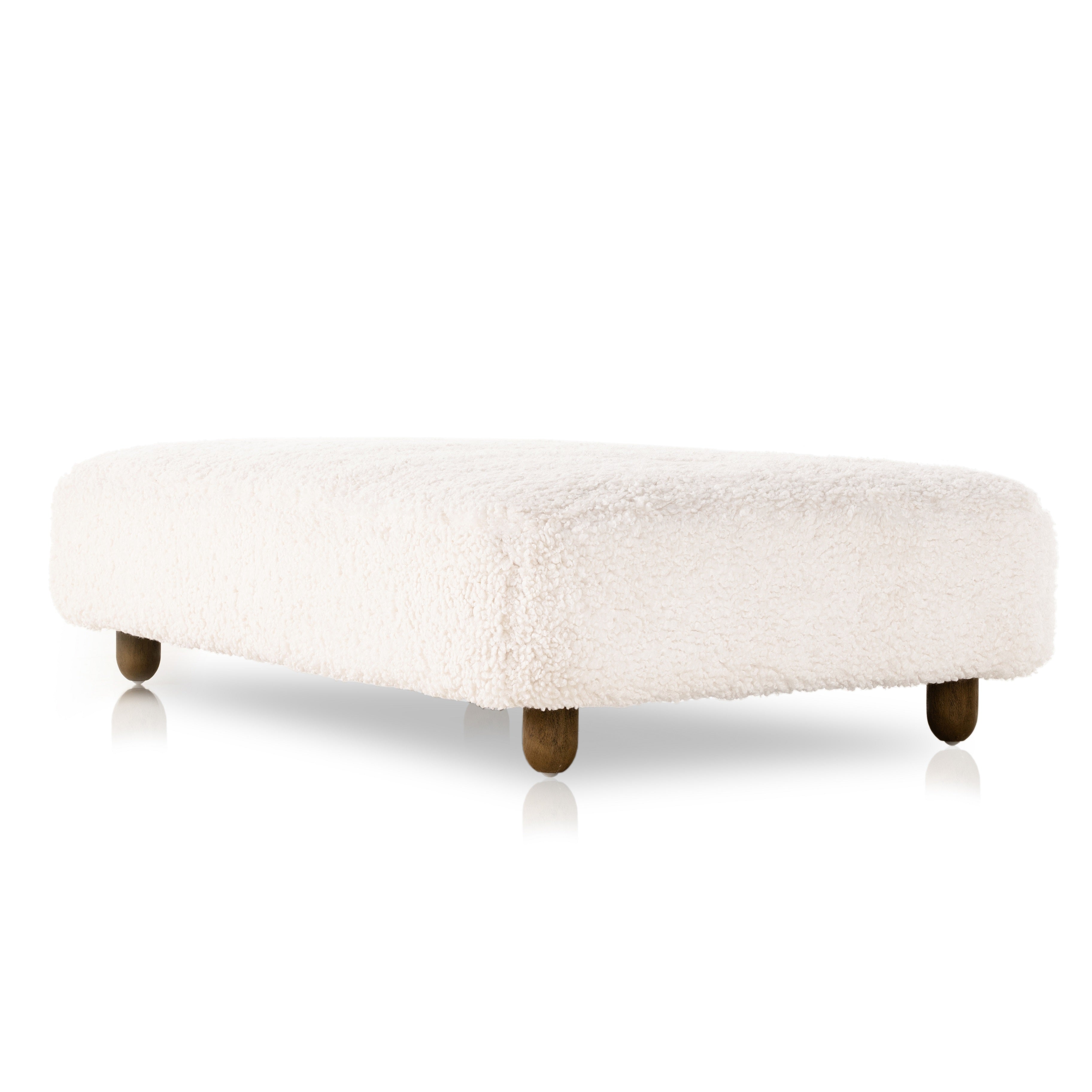 Place this Aniston Andes Natural Rectangle Ottoman just about anywhere for a subtle retro vibe. Upholstered in a faux Mongolian shearling with a high pile fur. Parawood legs are wirebrushed for a warm, vintage feel. Amethyst Home provides interior design services, furniture, rugs, and lighting in the Calabasas metro area.