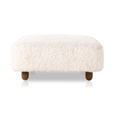 Place this Aniston Andes Natural Rectangle Ottoman just about anywhere for a subtle retro vibe. Upholstered in a faux Mongolian shearling with a high pile fur. Parawood legs are wirebrushed for a warm, vintage feel. Amethyst Home provides interior design services, furniture, rugs, and lighting in the Seattle metro area.