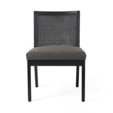 Antonia Savile Charcoal Cane Armless Dining Chair forms a simple-but-shapely frame for black seating and a natural cane back. Amethyst Home provides interior design services, furniture, rugs, and lighting in the Dallas metro area.