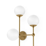 Matte glass spheres seem to extend and reach across smooth brass rods. Each globe is individually blown, shaped and sculpted by hand through a one-hour process. Matte globes are specially manufactured to evenly diffuse light. Brass and glass are 98% recyclable. Designed and sustainably made in Poland by Schwung.Overall Dimensions13.75"w x 13. Amethyst Home provides interior design, new home construction design consulting, vintage area rugs, and lighting in the Park City metro area.