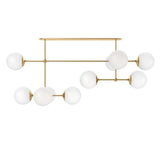 Matte glass spheres seem to extend and reach across smooth brass rods. Each globe is individually blown, shaped and sculpted by hand through a one-hour process. Matte globes are specially manufactured to evenly diffuse light. Brass and glass are 98% recyclable. Designed and sustainably made in Poland by Schwung.Overall Dimensions64.25"w x 30. Amethyst Home provides interior design, new home construction design consulting, vintage area rugs, and lighting in the Kansas City metro area.