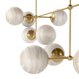 Marbled glass spheres seem to extend and reach across smooth brass rods. Each globe is individually blown, shaped and sculpted by hand through a one-hour process. Brass and glass are 98% recyclable. Designed and sustainably made in Poland by Schwung.Overall Dimensions64.25"w x 30.25"d x 28.75"hFull Details &amp; SpecificationsTear Shee Amethyst Home provides interior design, new home construction design consulting, vintage area rugs, and lighting in the Portland metro area.