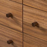 Inspired by campaign-style furniture of the 1800s â€” packable pieces first designed for traveling military use â€” a simply shaped dresser of natural walnut features a subtly inset top and rounded legs, finished with wooden hardware Amethyst Home provides interior design, new home construction design consulting, vintage area rugs, and lighting in the Charlotte metro area.