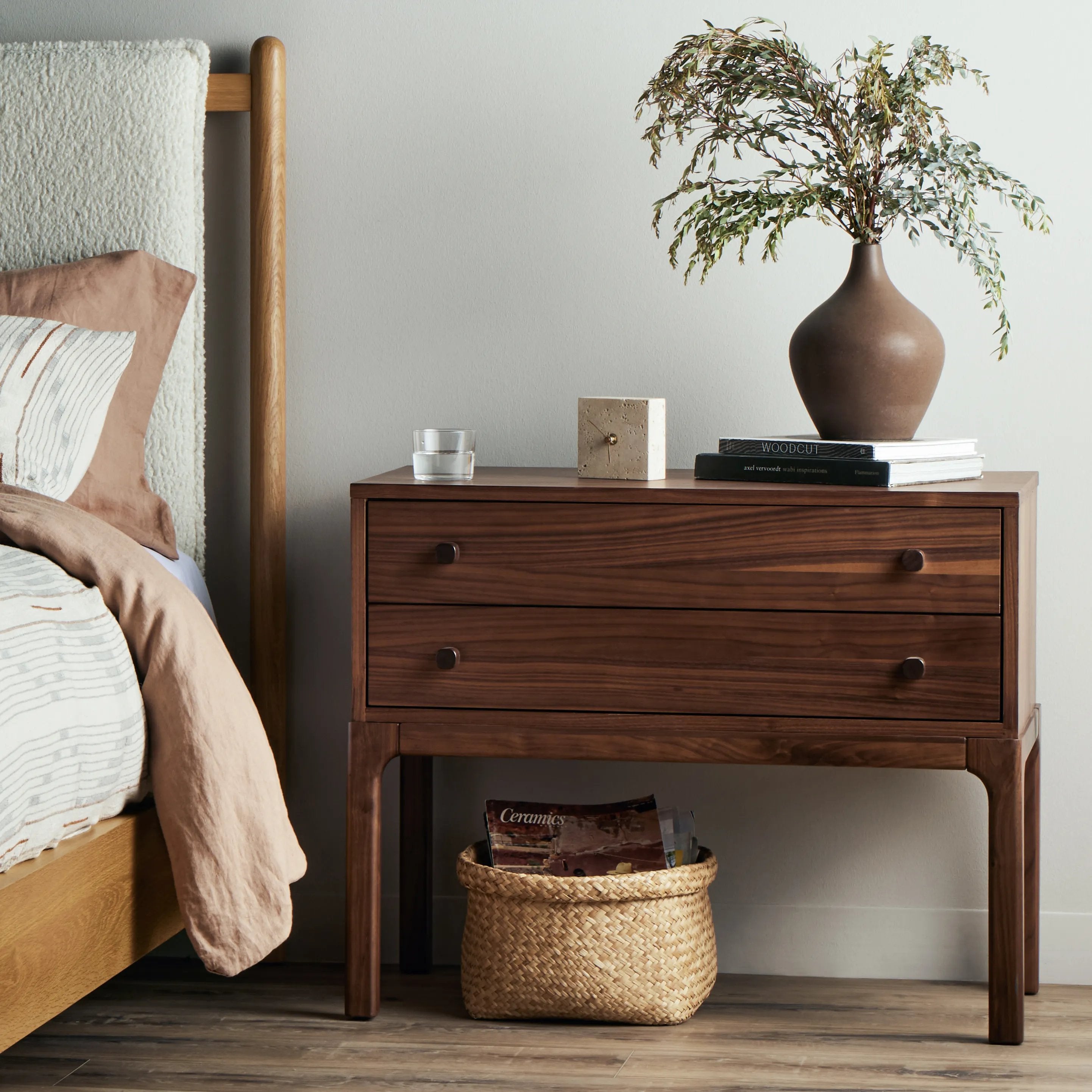 Inspired by campaign-style furniture of the 1800s â€” packable pieces first designed for traveling military use â€” a simply shaped nightstand of natural walnut features a subtly inset top and rounded legs, finished with wooden hardware Amethyst Home provides interior design, new home construction design consulting, vintage area rugs, and lighting in the Winter Garden metro area.