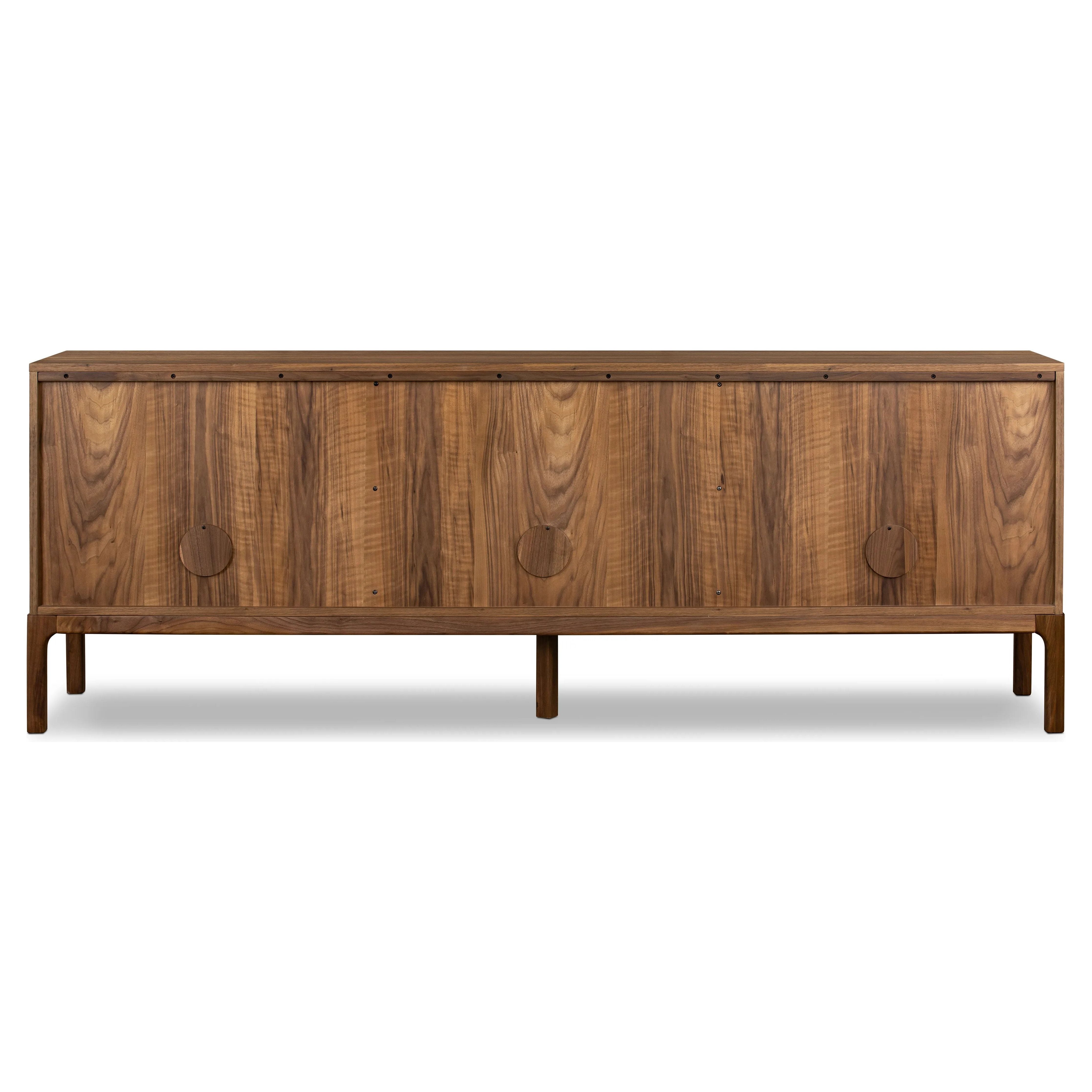 Inspired by campaign-style furniture of the 1800s â€” packable pieces first designed for traveling military use â€” a simply shaped sideboard of natural walnut features a subtly inset top and rounded legs, finished with wooden hardware Amethyst Home provides interior design, new home construction design consulting, vintage area rugs, and lighting in the Boston metro area.