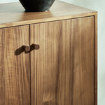 Inspired by campaign-style furniture of the 1800s â€” packable pieces first designed for traveling military use â€” a simply shaped sideboard of natural walnut features a subtly inset top and rounded legs, finished with wooden hardware Amethyst Home provides interior design, new home construction design consulting, vintage area rugs, and lighting in the Nashville metro area.