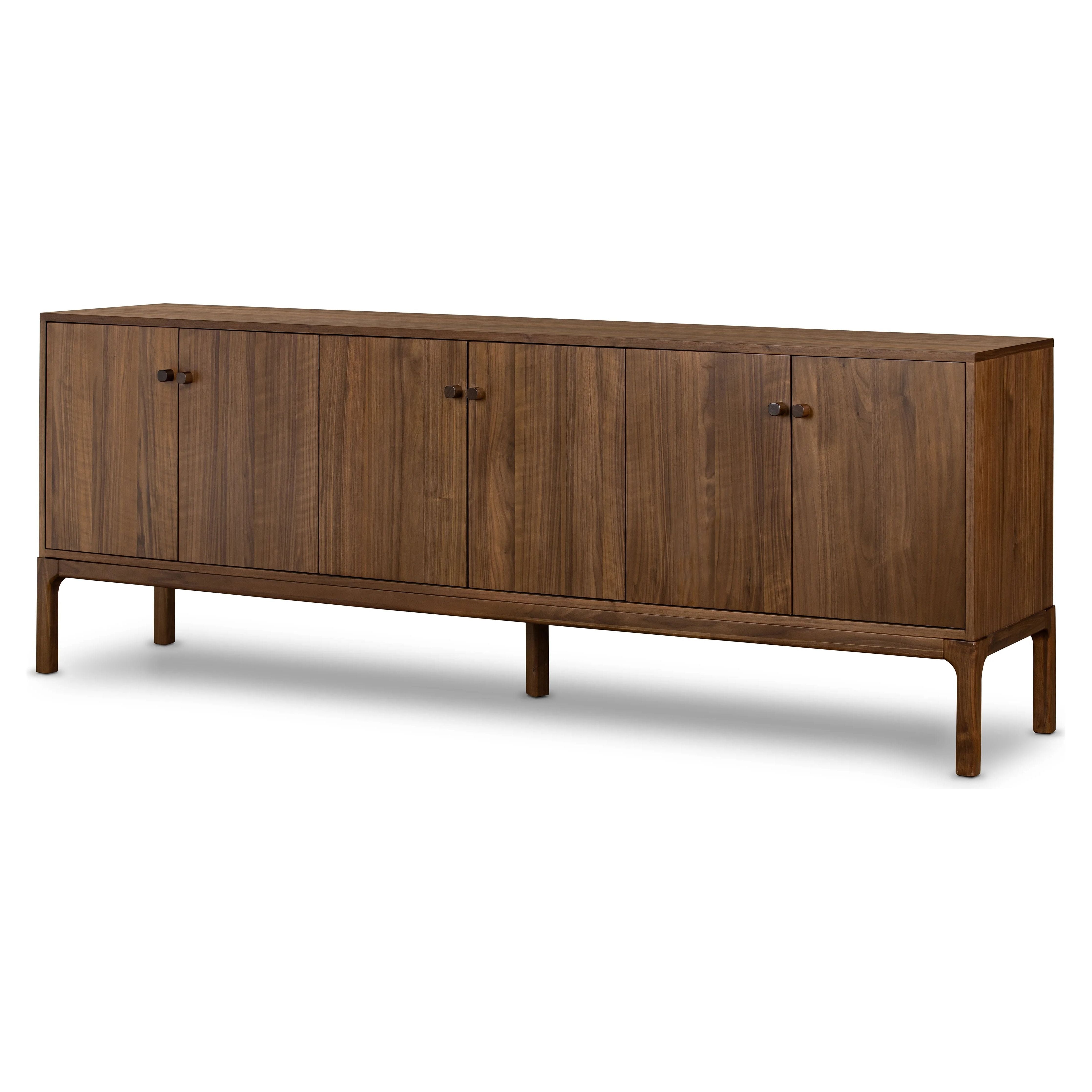 Inspired by campaign-style furniture of the 1800s â€” packable pieces first designed for traveling military use â€” a simply shaped sideboard of natural walnut features a subtly inset top and rounded legs, finished with wooden hardware Amethyst Home provides interior design, new home construction design consulting, vintage area rugs, and lighting in the Washington metro area.