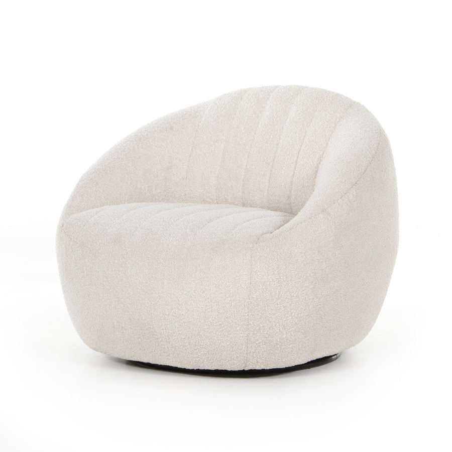 The Audie Knoll Natural Swivel Chair's performance fabrics are specially created to withstand spills, stains, high traffic and wear, ensuring long-term comfort and unmatched durability. Amethyst Home provides interior design services, furniture, rugs, and lighting in the Calabasas metro area.