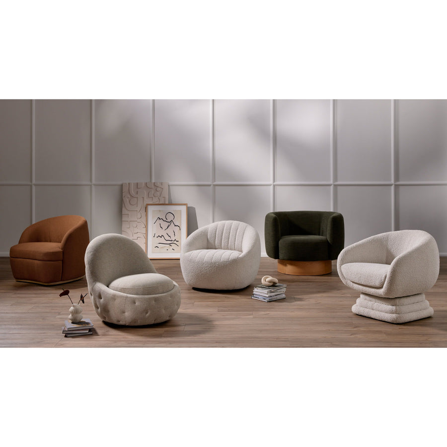The Audie Knoll Natural Swivel Chair's performance fabrics are specially created to withstand spills, stains, high traffic and wear, ensuring long-term comfort and unmatched durability. Amethyst Home provides interior design services, furniture, rugs, and lighting in the Los Angeles metro area.