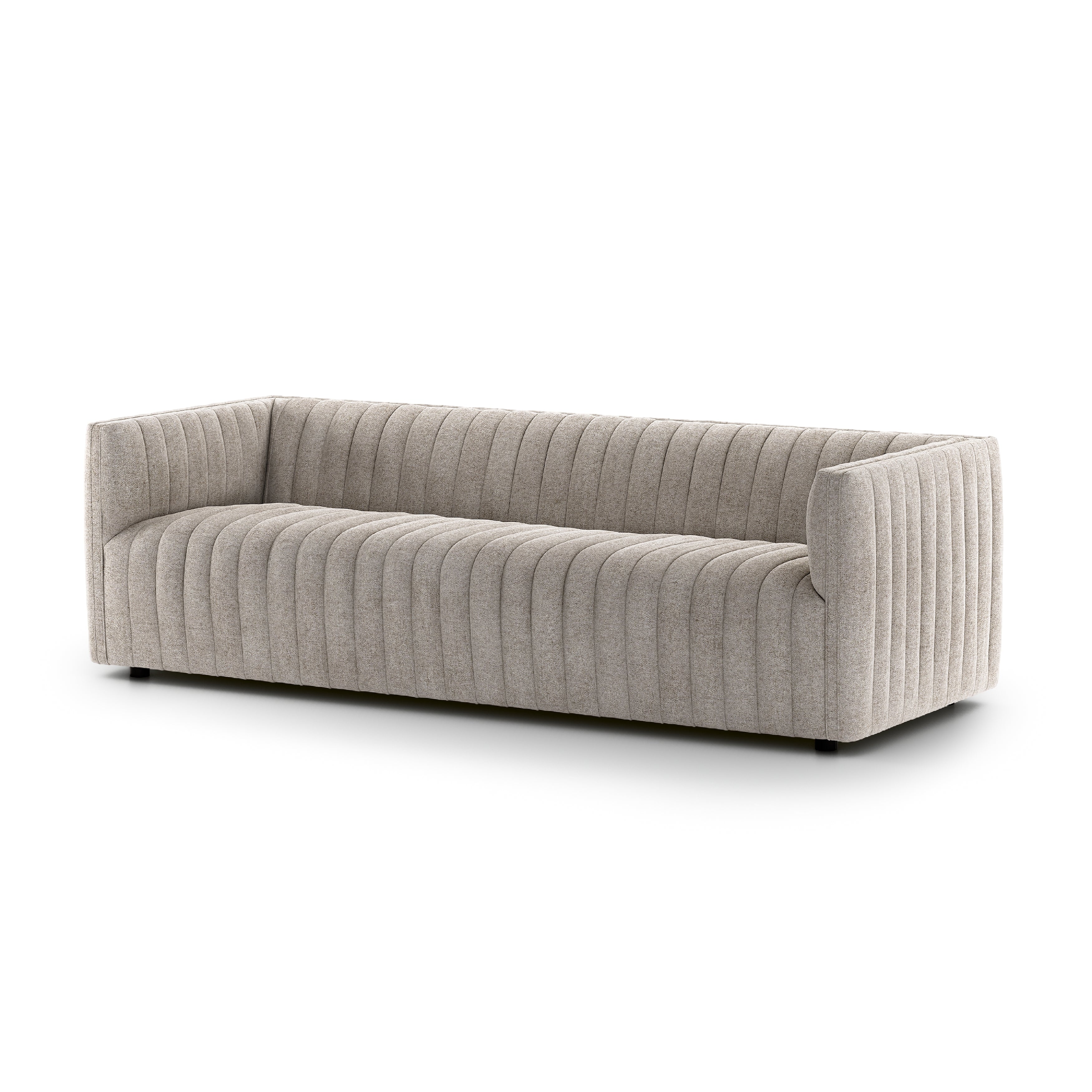 A dramatically channeled sofa with textural grey upholstery offers a clean look inspired by modern menswear. Amethyst Home provides interior design, new construction, custom furniture, and area rugs in the Alpharetta metro area.