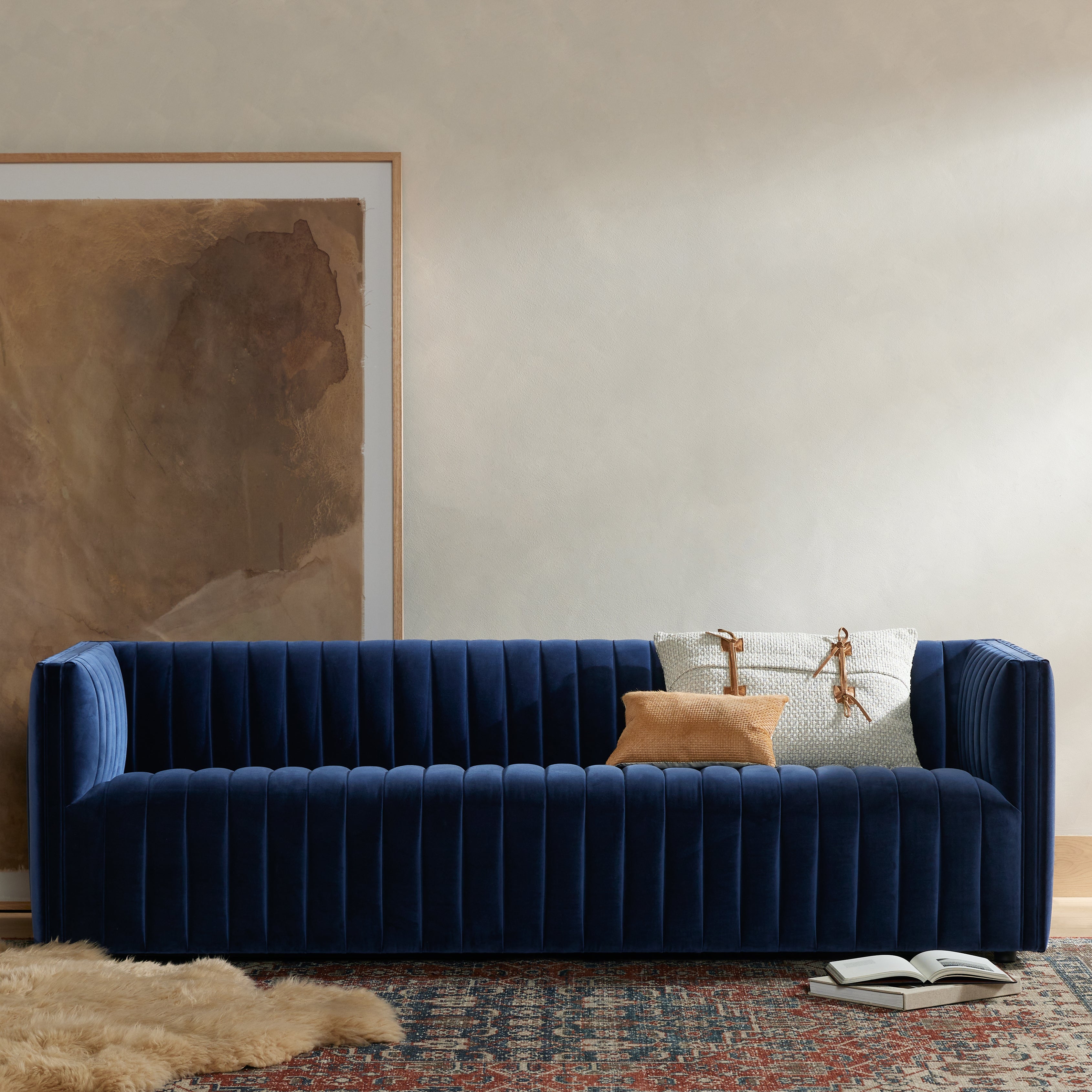 Velvety poly-blend seating takes on dramatic channeling and rich navy hue for trend-forward texture and sumptuous sit. Amethyst Home provides interior design, new construction, custom furniture, and area rugs in the Seattle metro area.