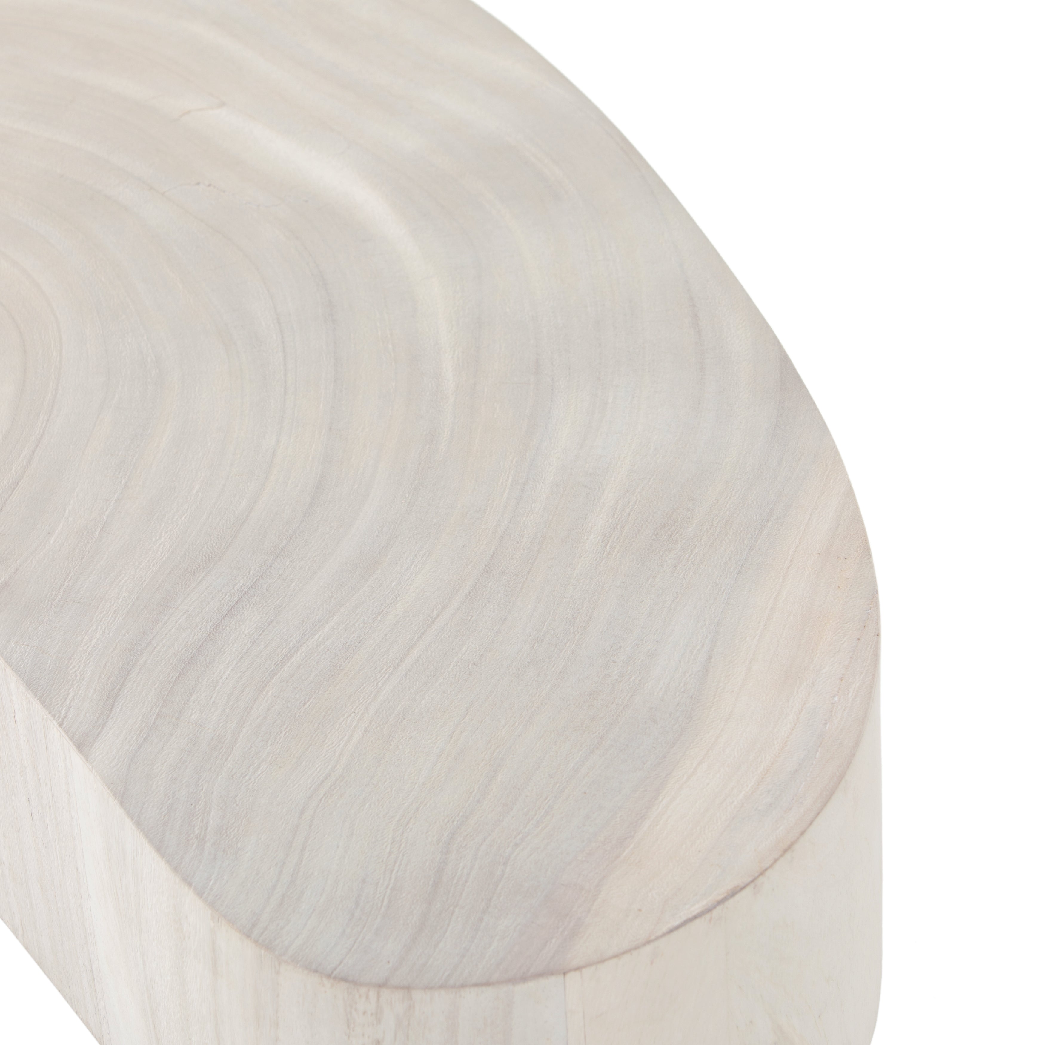 Natural beauty - total novelty. A thick slab of bleached, oyster-cut Guanacaste forms a tall, kidney-shaped coffee table. Visible rings speak to woods' natural graining, while a dark gunmetal-finished base provides clean contrast to the whole look. Amethyst Home provides interior design, new construction, custom furniture, and area rugs in the Salt Lake City metro area.