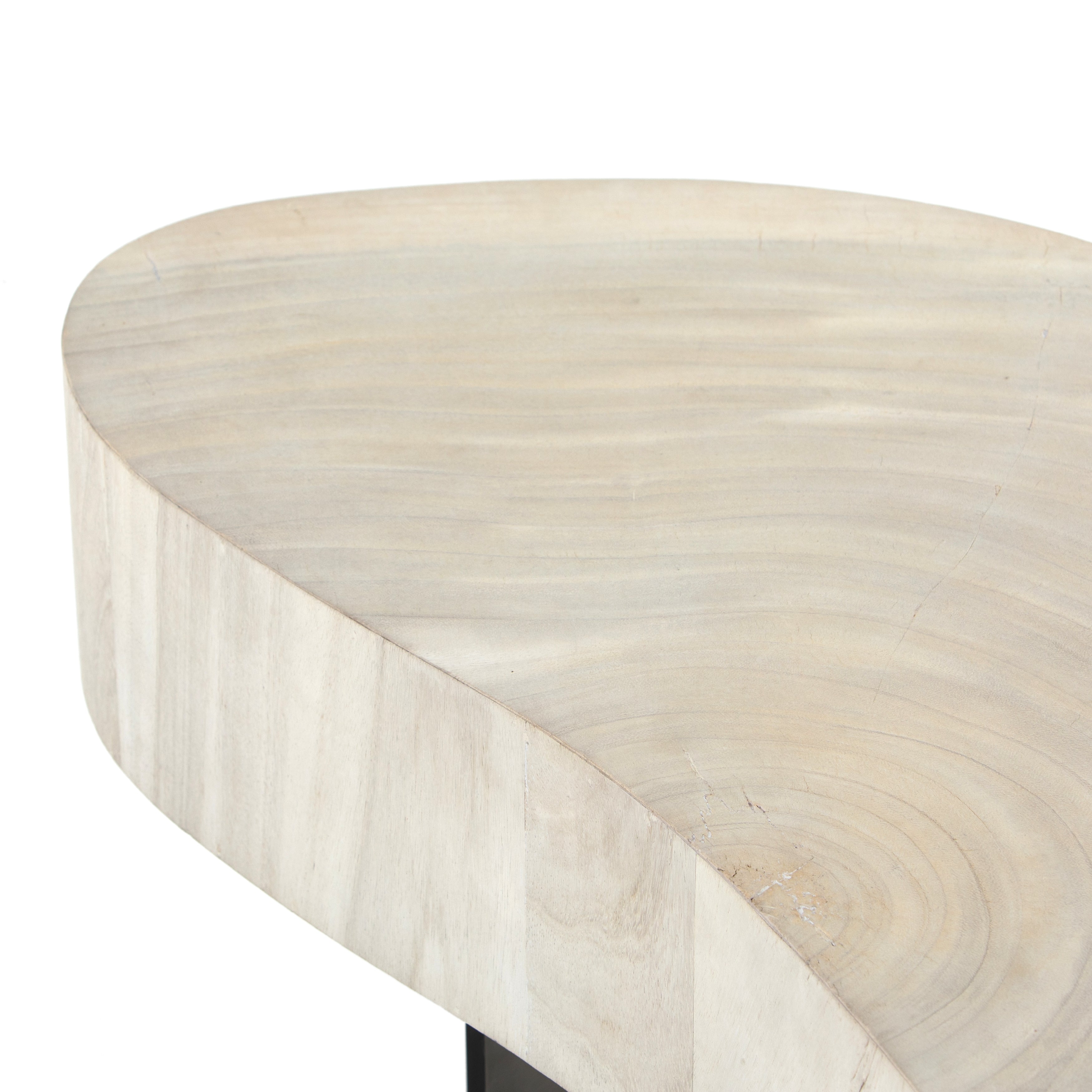 Natural beauty - total novelty. A thick slab of bleached, oyster-cut Guanacaste forms a tall, kidney-shaped coffee table. Visible rings speak to woods' natural graining, while a dark gunmetal-finished base provides clean contrast to the whole look. Amethyst Home provides interior design, new construction, custom furniture, and area rugs in the Winter Garden metro area.