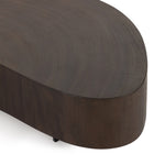 Natural beauty, total novelty. Oyster-cut Guanacaste forms a petite, kidney-shaped coffee table. Visible rings speak to woods' natural graining, while a dark gunmetal-finished base provides clean contrast to the whole look. Option to pair with taller piece, sold separately. Amethyst Home provides interior design, new construction, custom furniture, and area rugs in the Scottsdale metro area.